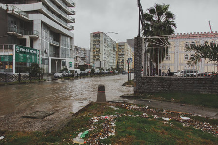 11.27.2023, Batumi, Georgia: roadway flooded by the sea and sewerage, garbage carried out from the...