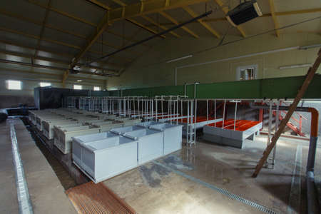 Fish-breeding factory in the Far East of Russia. Huge workshop with tanks for breeding Far Eastern chum salmon in the Primorsky regionのeditorial素材