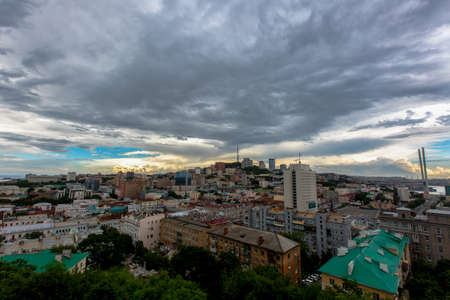 Summer, 2016 - Vladivostok, Russia - From Above. Panoramic view of the central part of Vladivostok. The historic center of the sea city on a background of cloudy sky.のeditorial素材