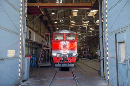 Summer, 2016 - Ussuriysk, Primorsky Krai - Ussuriysky Locomotive Repair Plant. Old red locomotive...