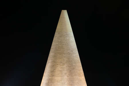 Washington Monument shot from below against the background of the night sky.のeditorial素材