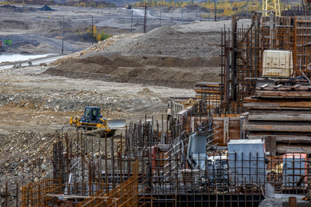 Autumn, 2016 - Magadan, Russia - Construction of the Ust-Srednekanskaya hydroelectric station. Hydroelectric workers sit by the turbine in the engine roomのeditorial素材
