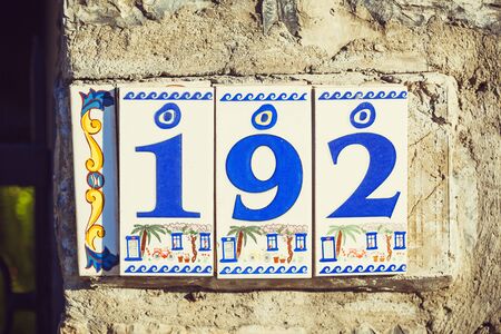 Number one hundred ninety-two, vintage plate number 192 summerの写真素材