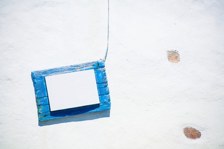 Vintage building blue frame on the white wallの写真素材