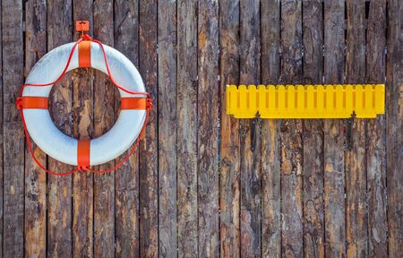 Decorative elements on the marine theme on the background of wooden boardsの写真素材
