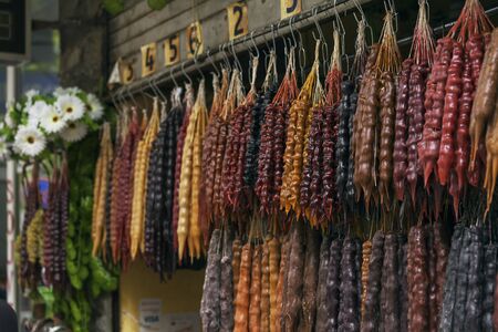 The hanging linking of beautiful multi-colored tasty churchkhelaの写真素材