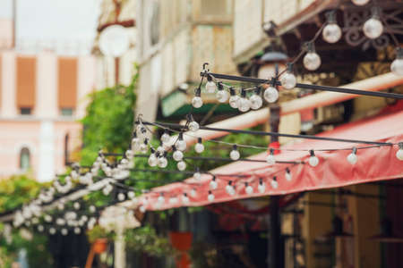 Beautiful light bulb , Christmas decoration. Bulbs garland in the shopの写真素材