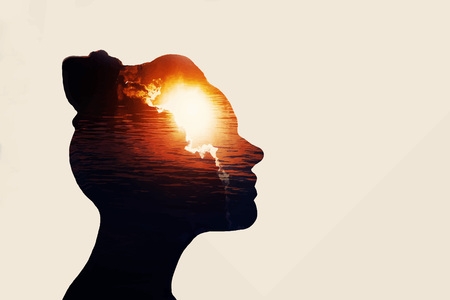 The concept of the power of knowledge. Silhouette of smart girl.のイラスト素材