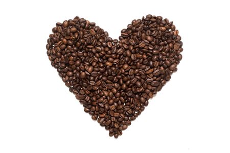 Coffee beans heart shape. Isolated on white background.の写真素材