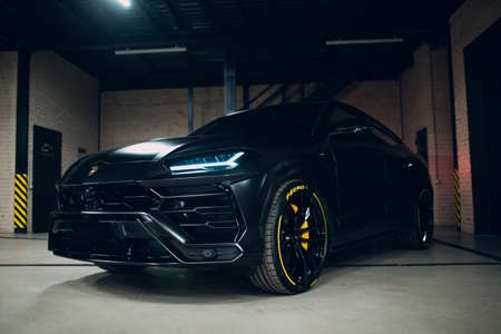 Lamborghini Urus black color sports car close up.のeditorial素材