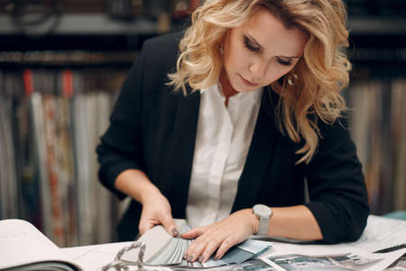 Interior designer woman at work. Design and interior decoration.