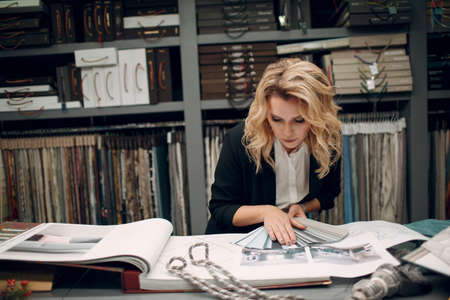 Interior designer woman at work. Design and interior decoration.の写真素材