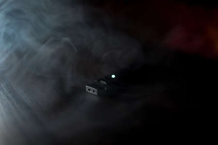 MOSCOW - 26 June 2020: Juul e-cigarette nicotine vapor stick and pods.