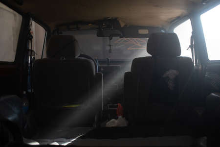 Old Car vehicle interior with sunbeam interior.の写真素材