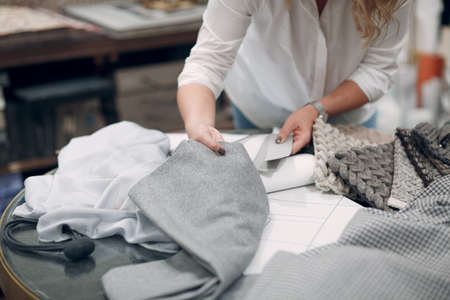 Interior design concept. Designer with fabric and project.の写真素材