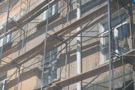 Scaffolding on building house in the cityの写真素材