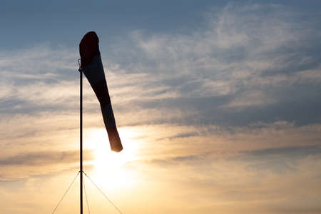 Airport windsock or wind cone for indication local wind direction.