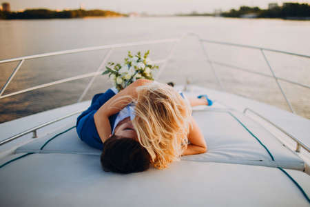 Wedding couple bride and groom together forever on yacht.の写真素材