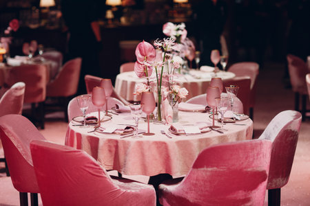 Romantic dinner pink decor table at restaurant.の写真素材