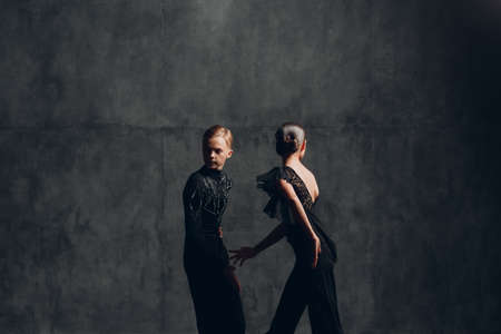 Young couple dancing in ballroom dance Paso doble.の写真素材
