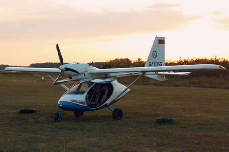 RUSSIA, MOSCOW - AUGUST 1, 2020: Small private single engine propeller airplane at sunset regional...