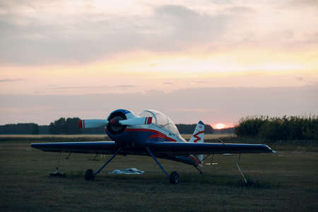 RUSSIA, MOSCOW - AUGUST 1, 2020: Small private single engine propeller airplane at sunset regional...