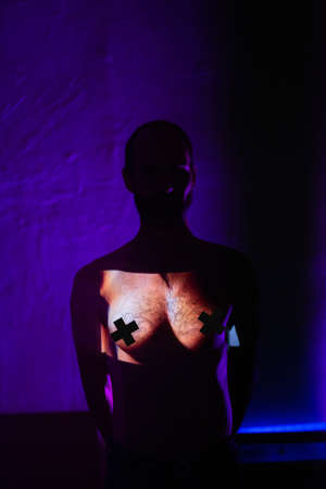 Concept of tansgender androgynous man with woman chest.の写真素材