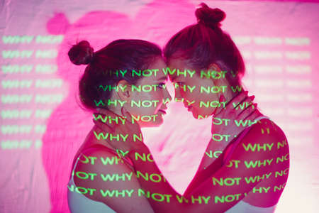 Portrait of two kissing couple young women.の写真素材