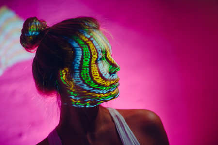 Young adult woman with word Freedom on her face.の写真素材