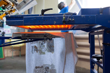 Drying oven for Serigraphy silk screen print process at clothes factoryの写真素材