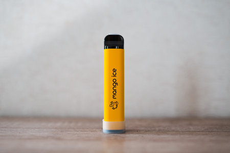 Vape yellow mango electronic cigarette popular system IZI.の写真素材