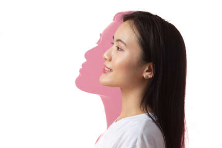 Multiple exposure portrait of asian woman with positive smile and serious sad facial expression....