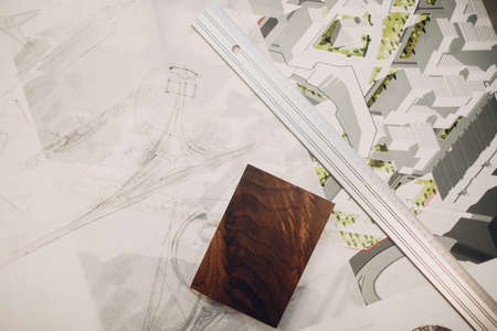 Drawings blueprints and layout design project at office table with ruler.の写真素材