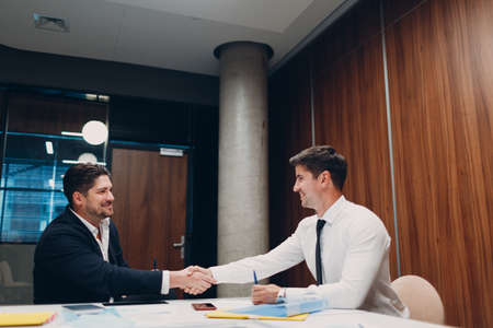 Job interview HR with business people talking on meeting at office and shaking hands. Human resources conceptの写真素材