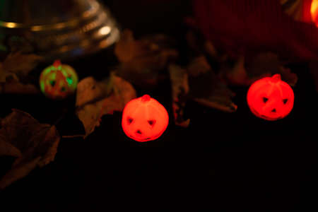 Halloween pumpkin head lantern with scary jack faces in dark.の写真素材