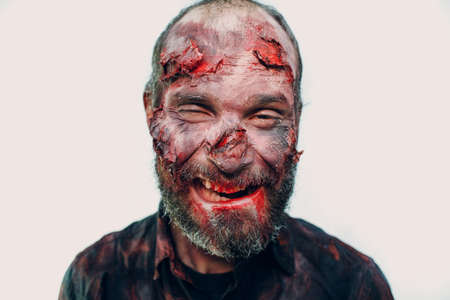 Zombie male makeup for halloween concept on white backgroundの写真素材