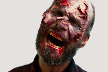 Zombie male makeup for halloween concept on white backgroundの写真素材