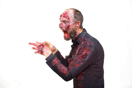 Zombie male profile view for halloween concept on white backgroundの写真素材