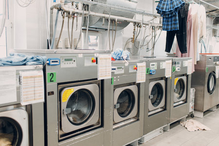 Dry cleaning clothes. Clean cloth chemical process. Laundry industrial dry-cleaning.の写真素材