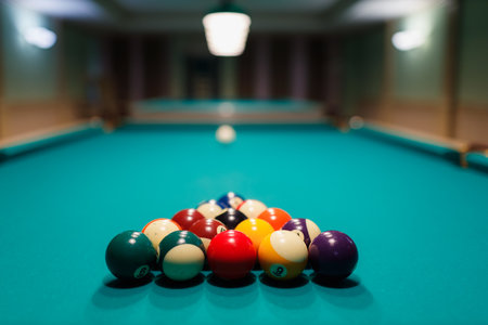 Billiard accessories balls and pyramid on a billiard table