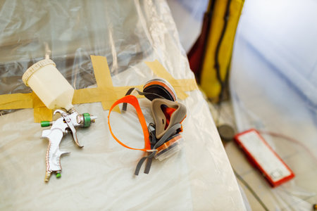 Spray gun and respirator for painting vehicleの写真素材
