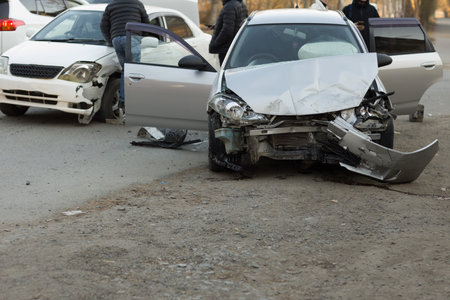 Car crash accident damage wreck vehicle in street traffic.の写真素材