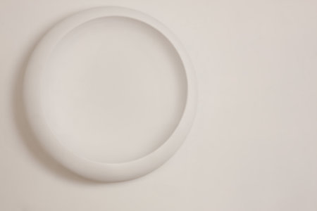 Empty round frame on light grey background product presentation mockup minimal flat lay.の写真素材