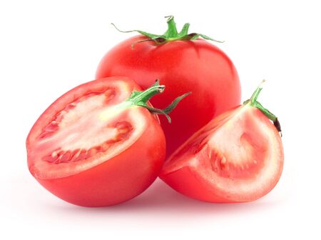 Beautiful issolated tomato with green leaf on white backgroundの写真素材