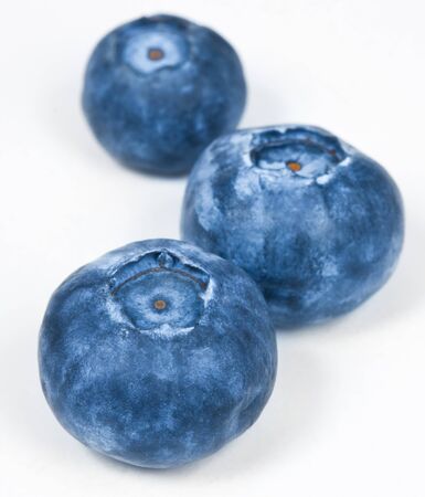 Ripe and Fresh Blueberries On A White Backgroundの写真素材