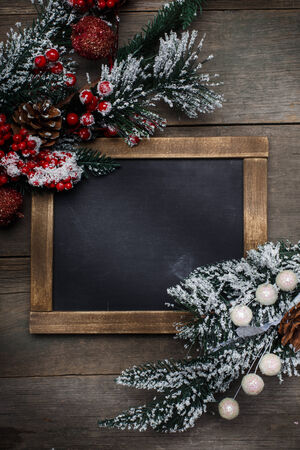 Christmas background. Christmas and New Year decorations on wooden background of aged boards.の写真素材