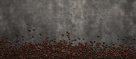 Whole bean coffee isolated on grey banner concrete background