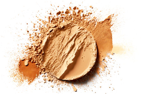 cosmetic powder smeared beige foundation isolated on white backgroundの写真素材