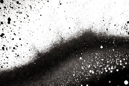 grainy black glitter abstract texture on white background