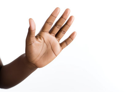 shot of a young person holding their hand open against a white backgroundの素材